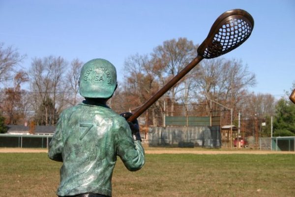 Boy Playing Lacrosse